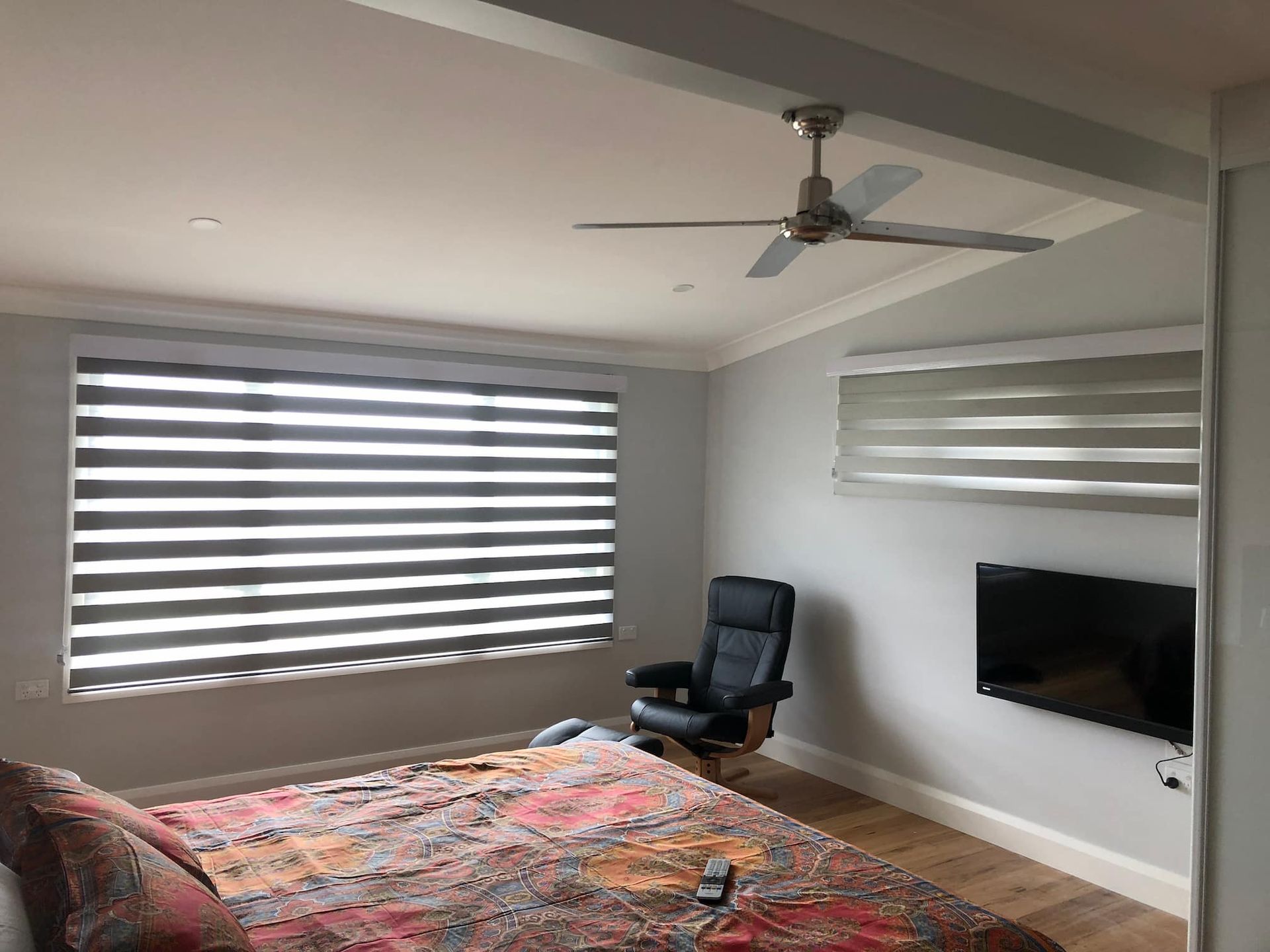 Close View Of Bedroom With Wide Window And Blinds — Window Coverings in Exeter, NSW