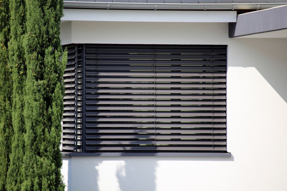 Window with Dark Grey Blinds — Window Coverings in Moss Vale, NSW