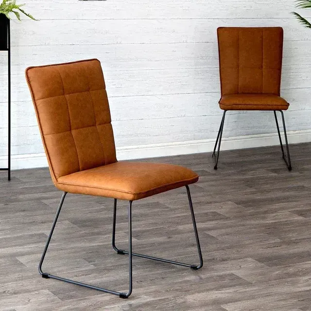 Tan Panel Back Chair with Angled Legs
