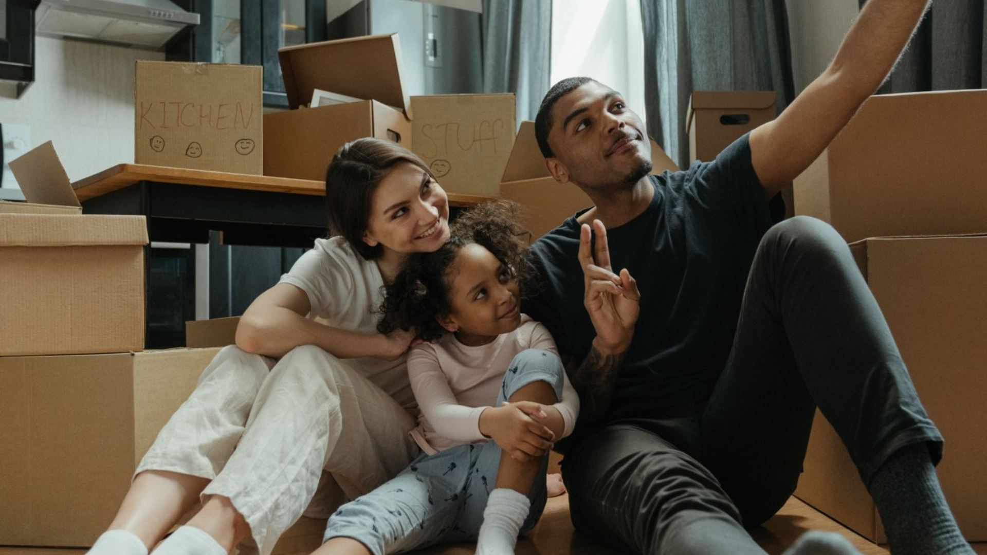 Couple signing first mortgage application
