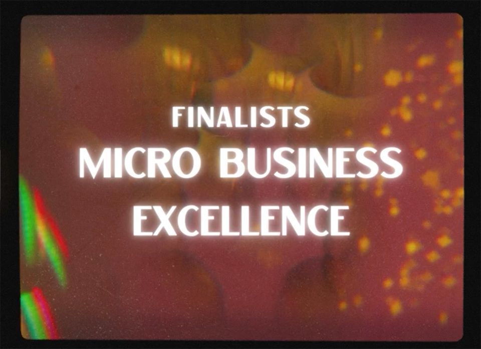 Finalists title on dark red background with orange bokeh lights: “MICRO BUSINESS EXCELLENCE”