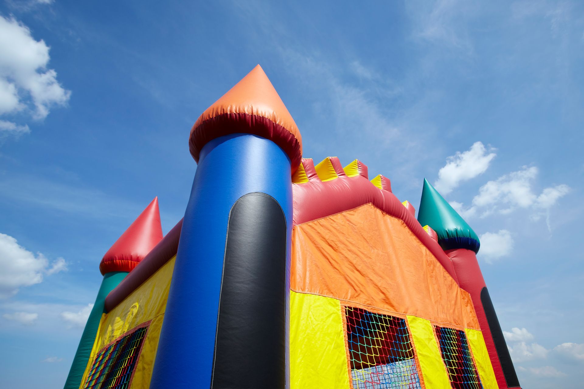 Colorful Bouncy Castle with a Blue Sky Background on it | Rancho Cucamonga, CA | Jam Jam bounce house and inflatable party