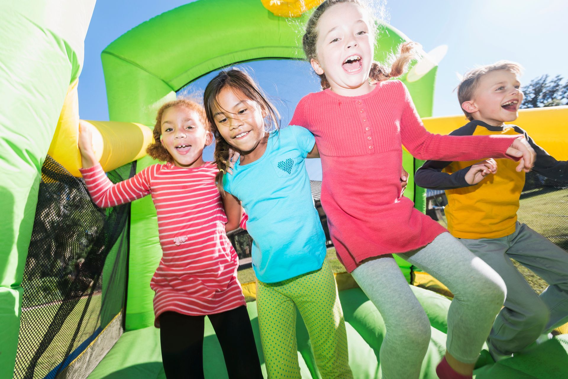 Children Happily Jump in the Bouncy House Jam Jam Bounce Castle | Rancho Cucamonga, CA | Jam Jam House of Party Rentals