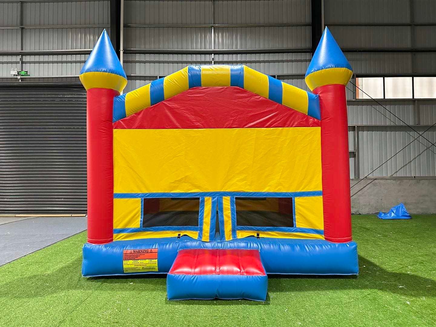 Red, Blue, and Yellow Bouncy Castle | Rancho Cucamonga, CA | Jam Jam Bounce house & inflatable party rentals