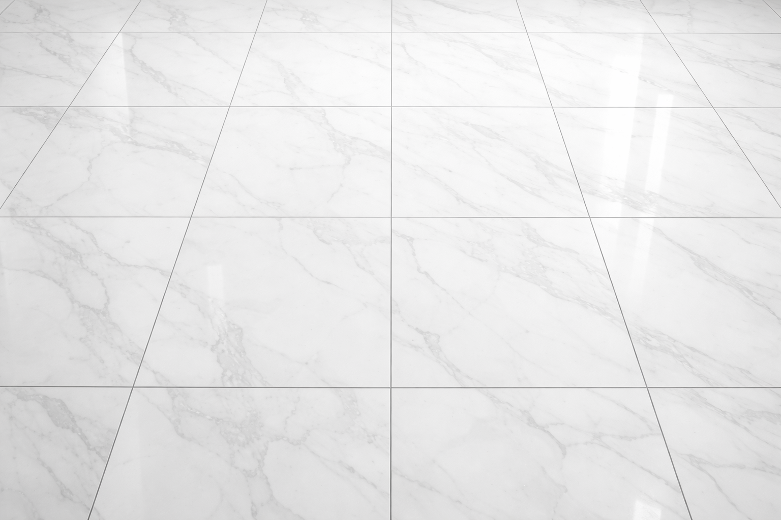 Inside a craft store, showcasing stamps and patterned paper on display racks, with a bright interior.