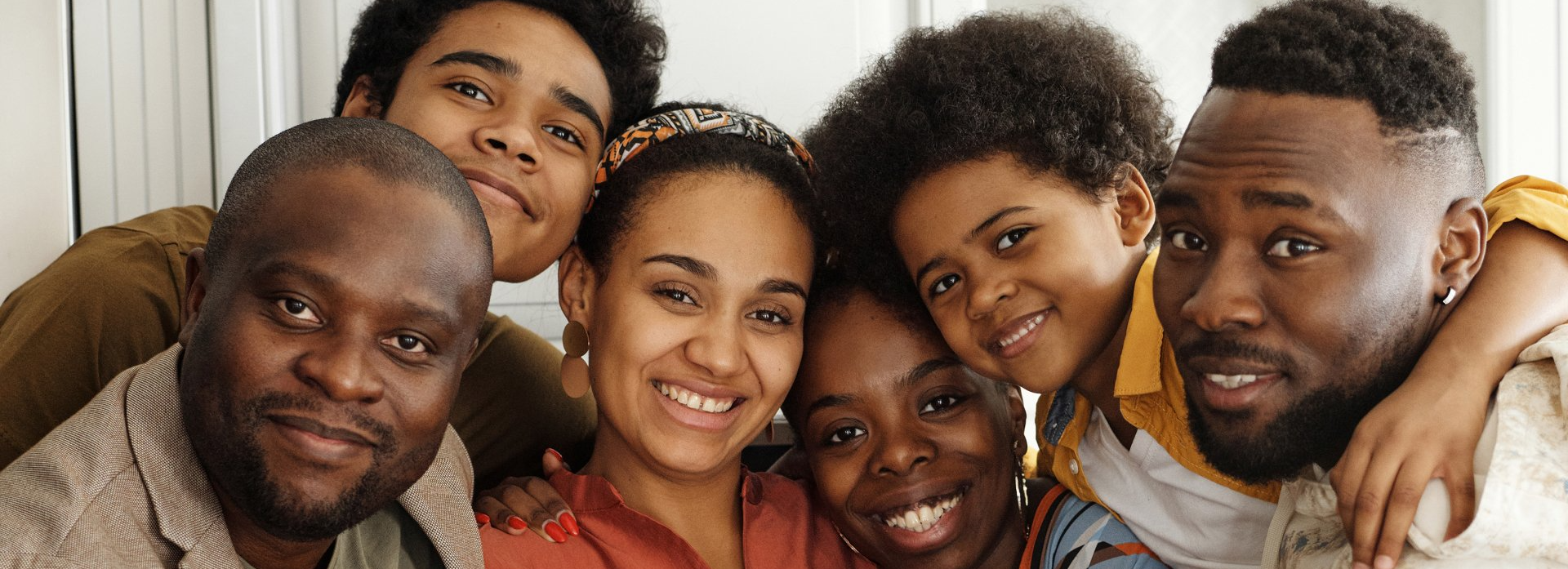 A group of people are posing for a picture together.