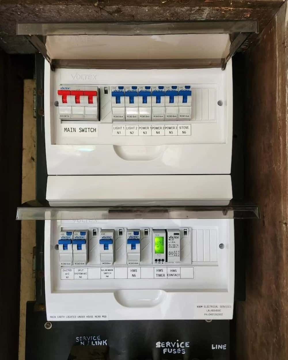 Two Electrical Boxes Are Stacked On Each Other — KARM Electrical Services In Medowie, NSW