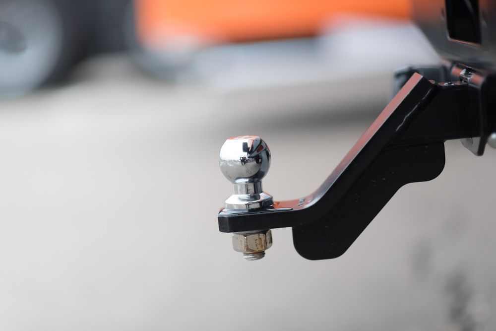 A Close Up Of A Tow Ball Attached To The Back Of A Car— BOEX Tyres And Performance in Marulan, NSW