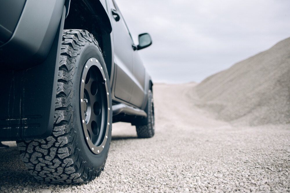 A Four Wheel Drive On A Gravel Road — BOEX Tyres And Performance in Mittagong, NSW