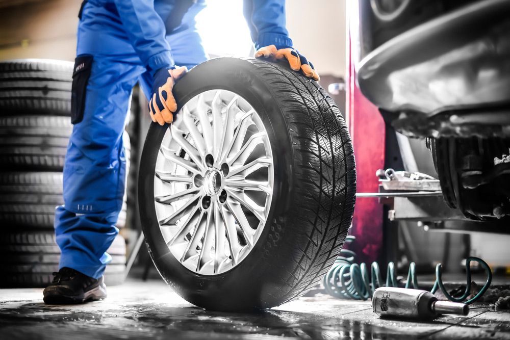 Changing Wheel Alloy Tire — BOEX Tyres And Performance in Bowral, NSW