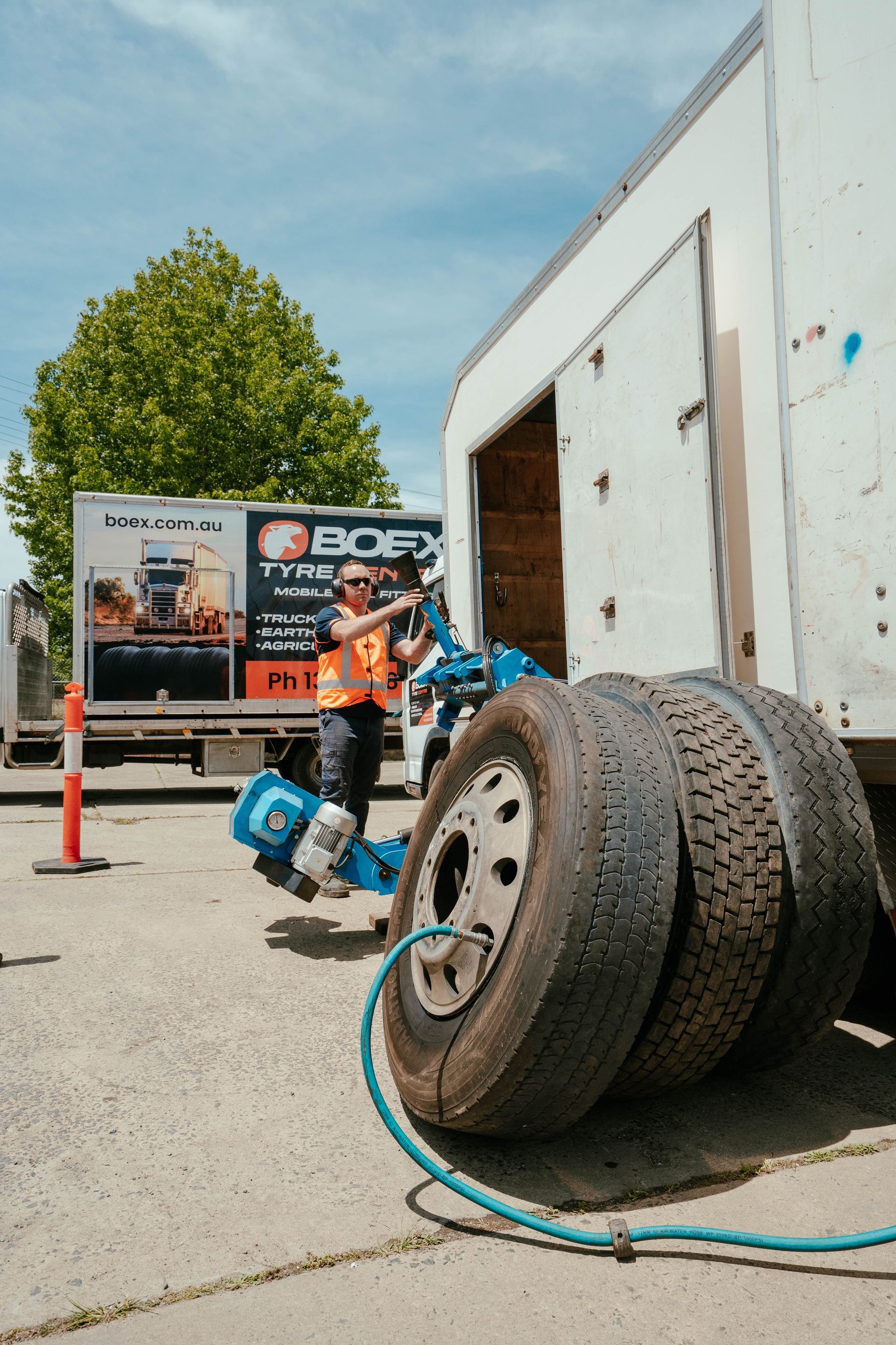 A Close Up of a Large Tyre on a Yellow Truck — BOEX Tyres And Performance in Bowral, NSW
