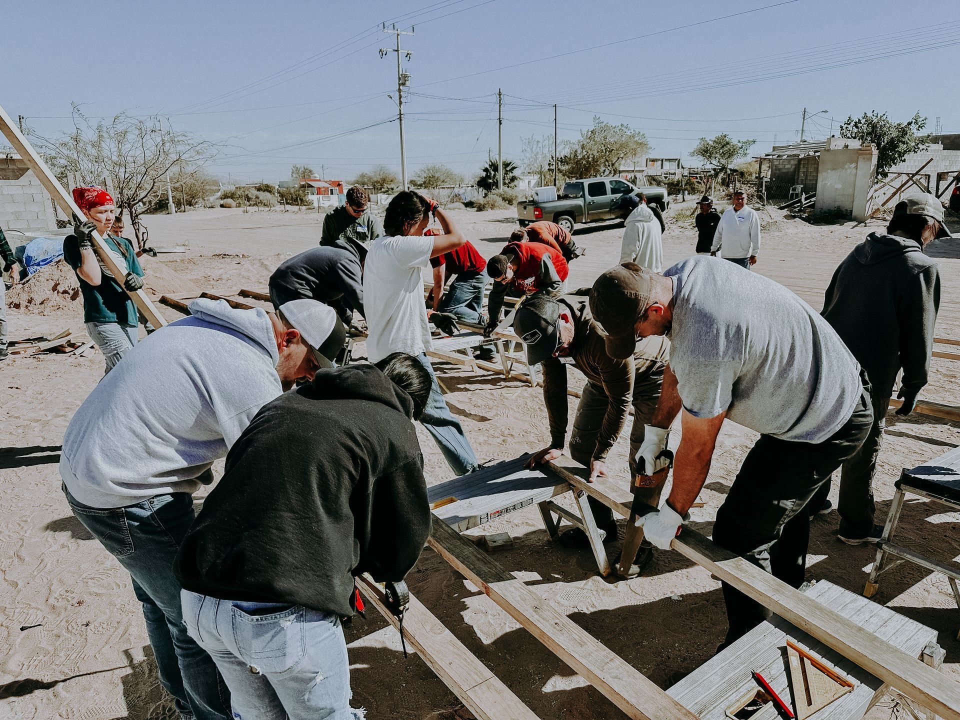 A group of people are working on a construction site.