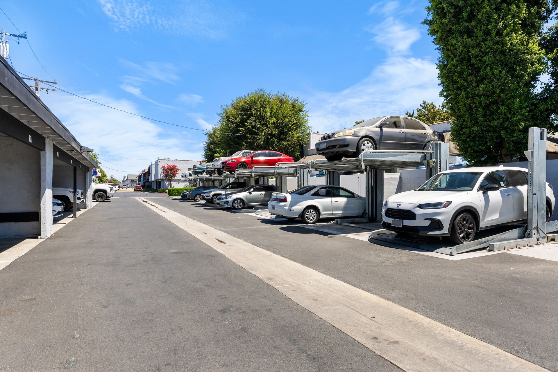 Vertical car lifts and cars