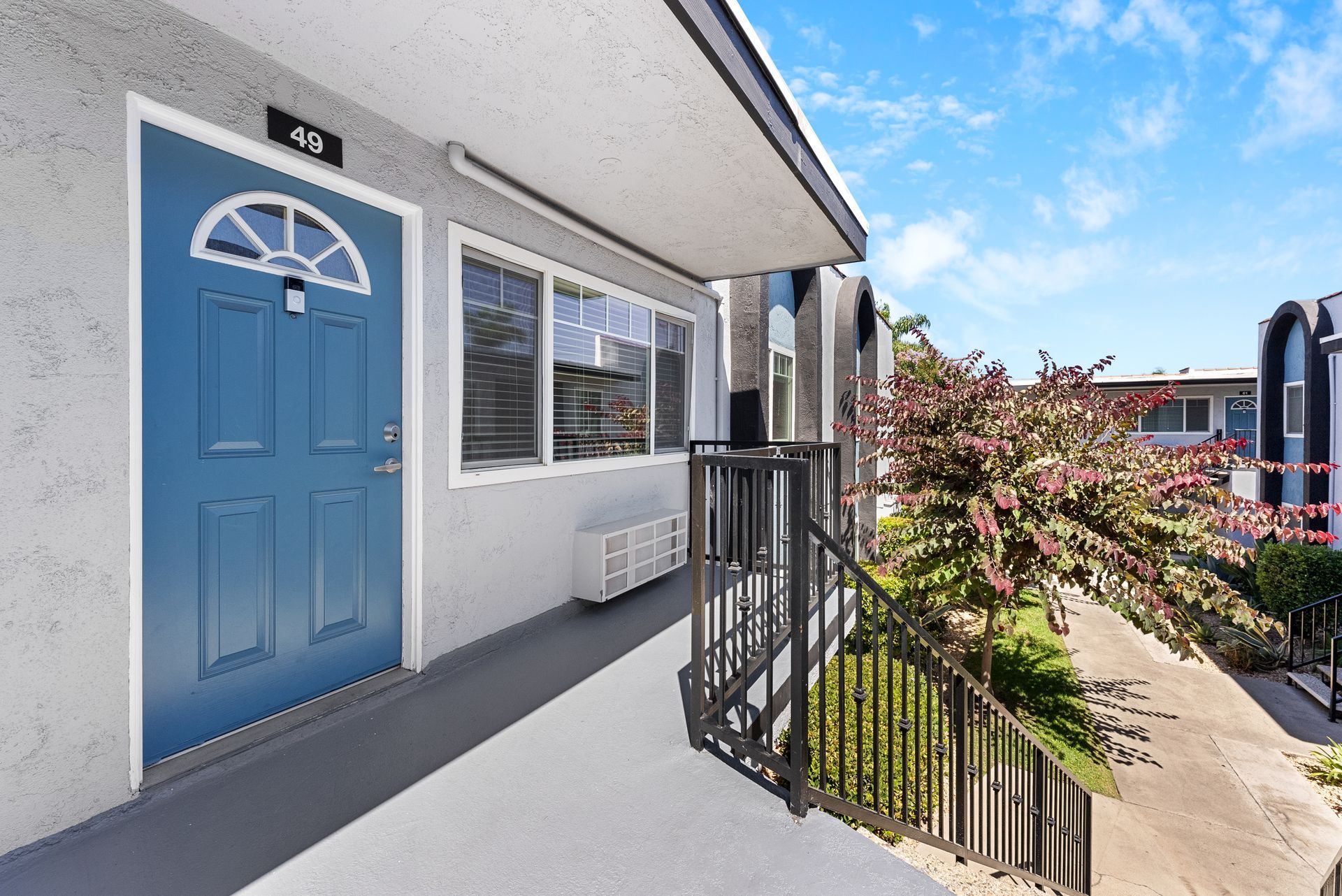 Front door and staircase leading down
