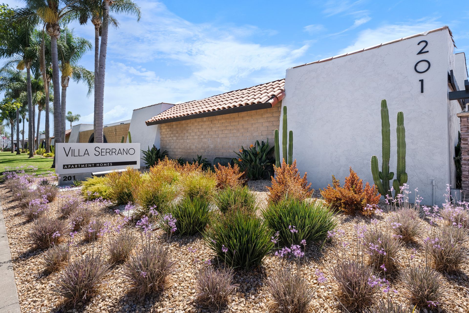 Building front and bushes