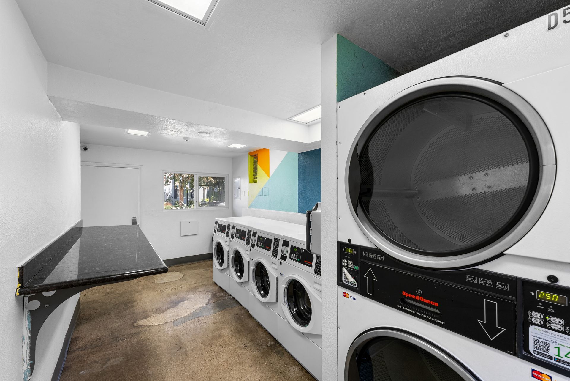 Washers and dryers in laundry room