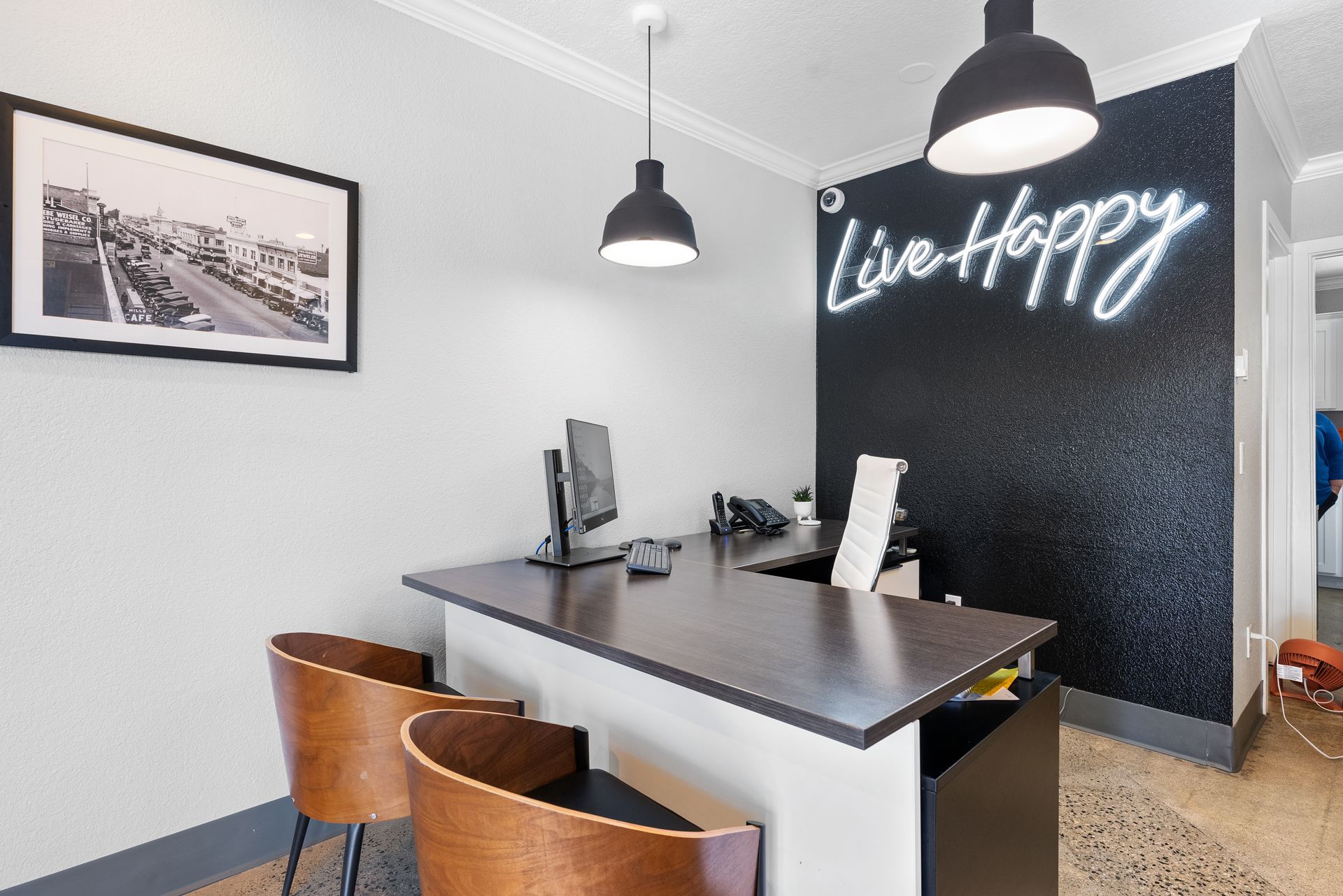 Villa Serrano office and Live Happy sign