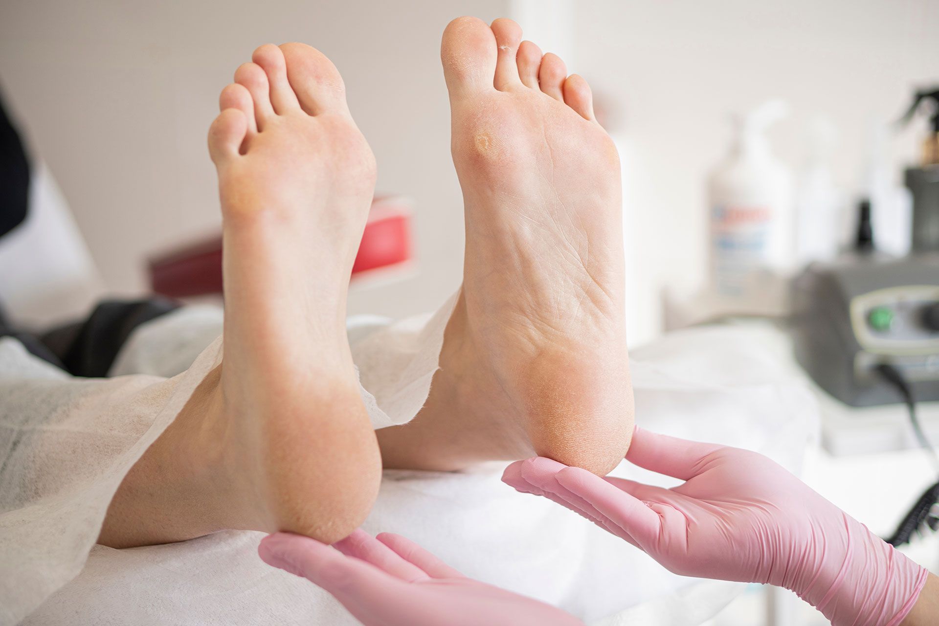 A person is getting a foot massage on a table.