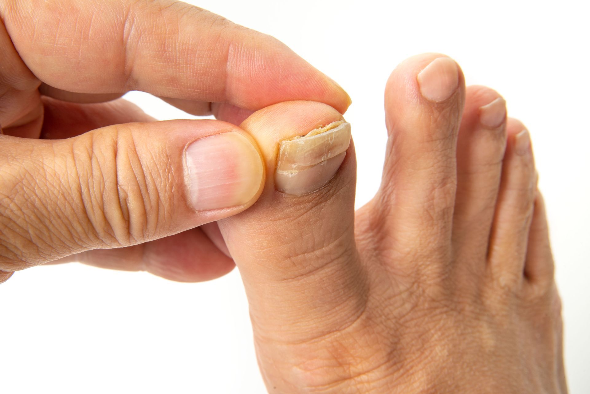 A person is getting a foot massage on a table.