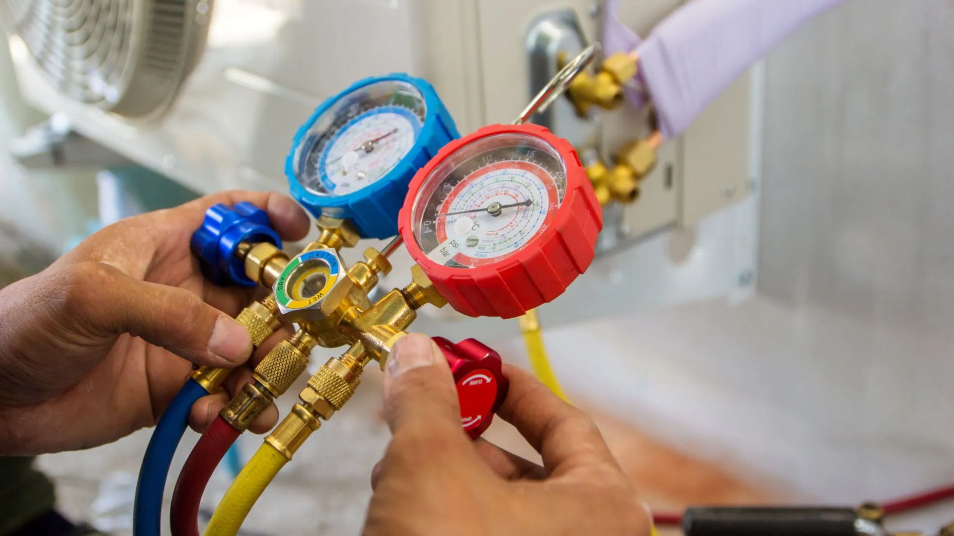 A hallway with a lot of windows and a staircase
