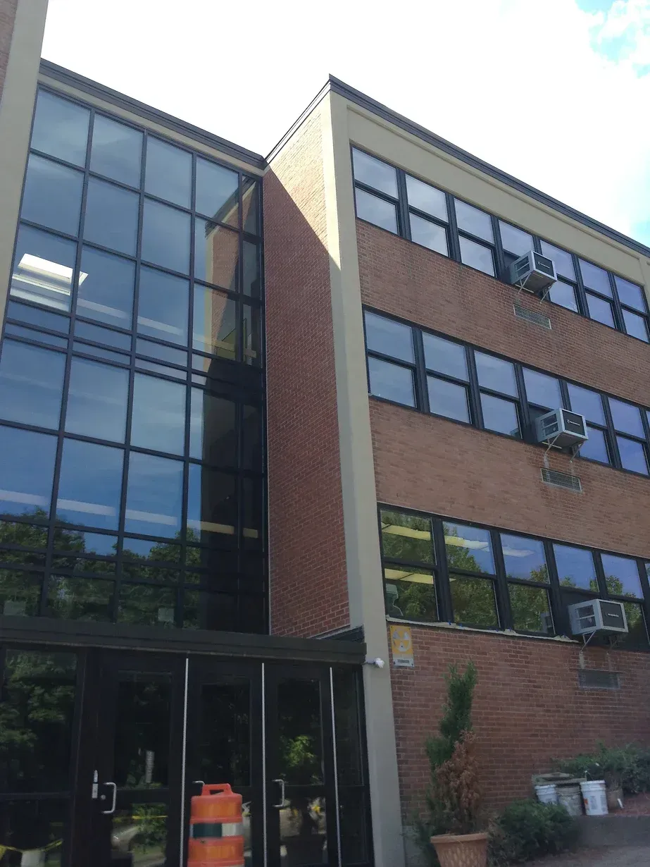 A large brick building with a lot of windows