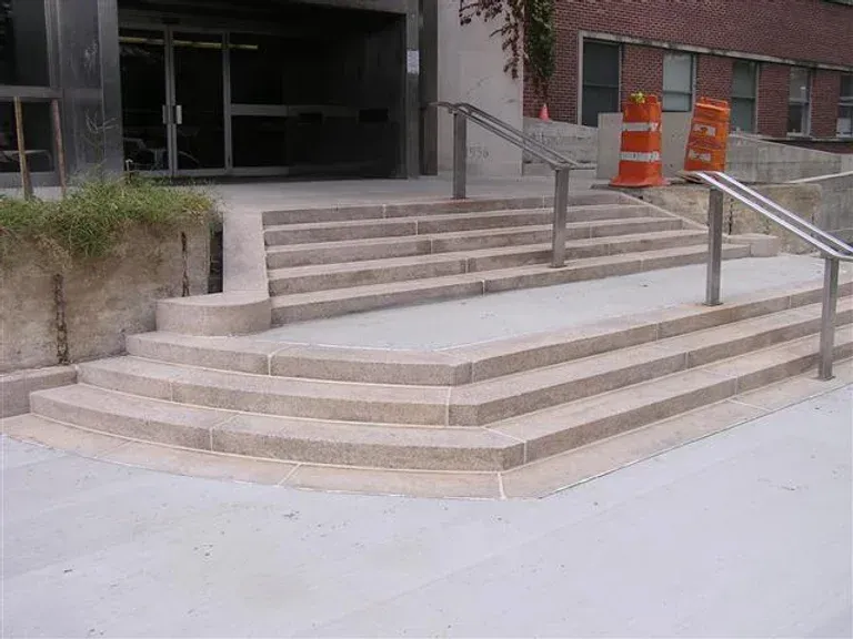 A set of stairs leading up to a building