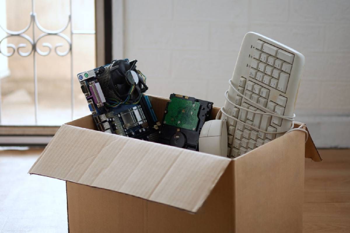 Old electronic equipment in a box ready to drop off for media destruction near Lexington, Kentucky (KY)