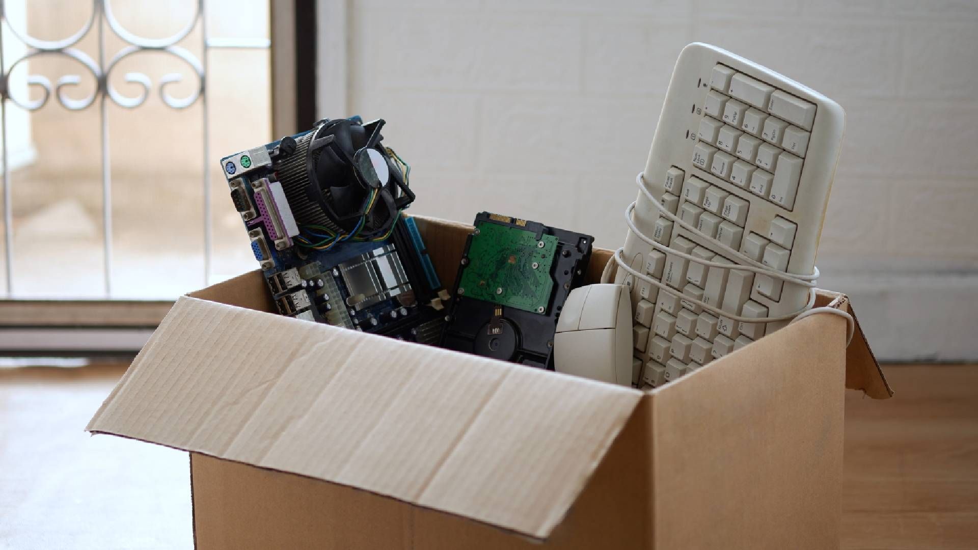 Old electronic equipment in a box ready to drop off for media destruction near Lexington, Kentucky (