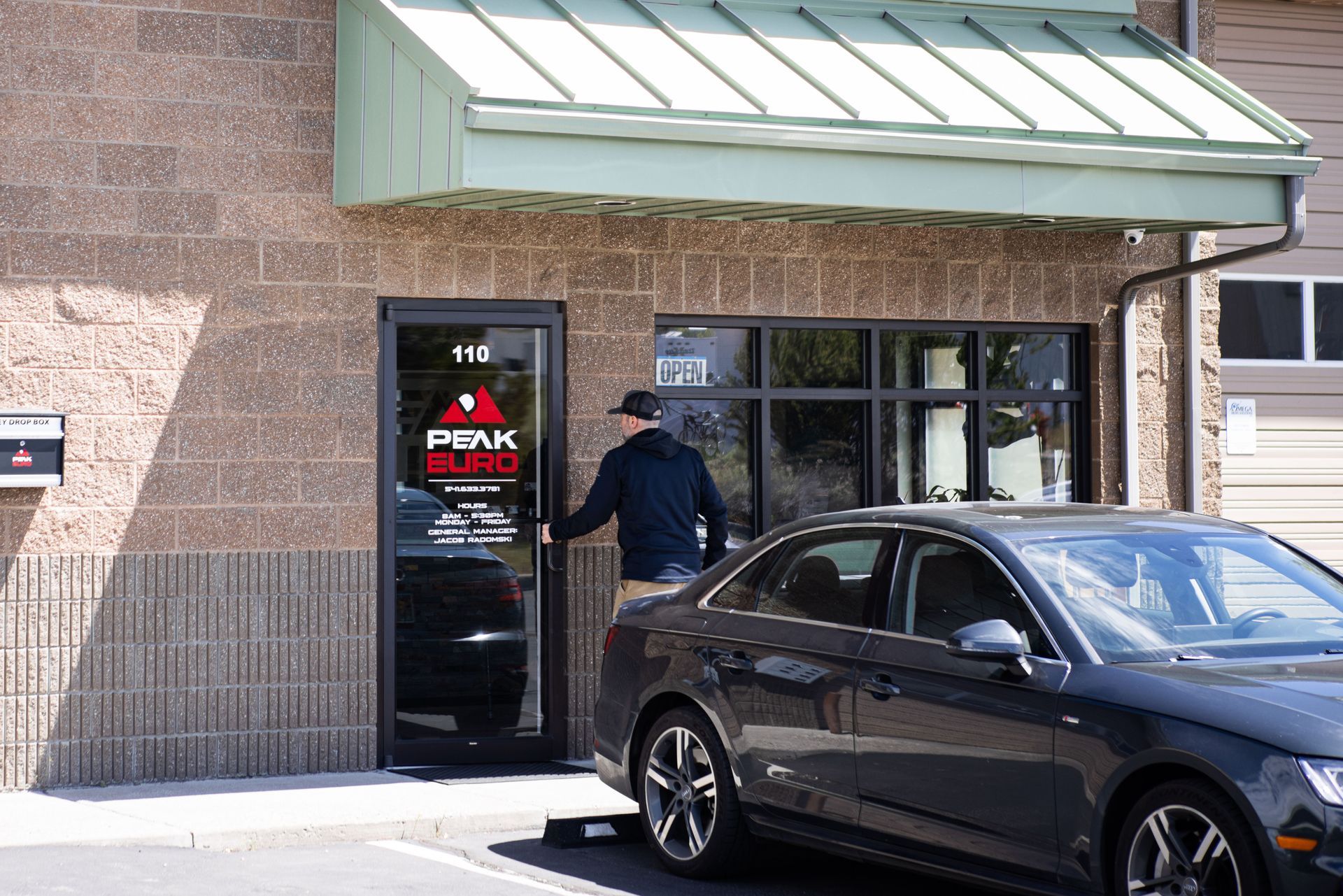 A man enters a building with a 