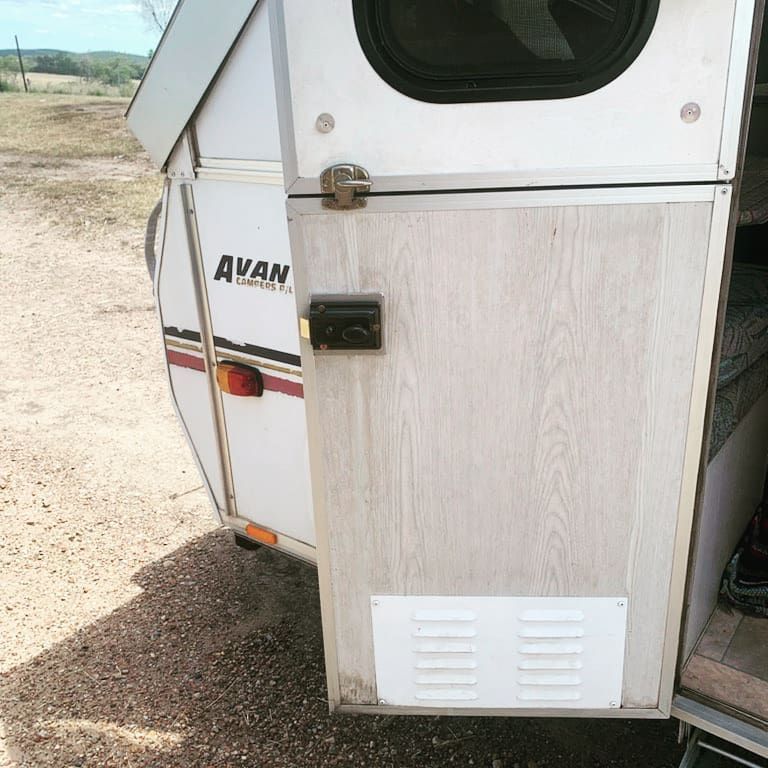 A Caravan Is Parked on The Side of A Road — Toowoomba Locksmiths in Dalby, QLD