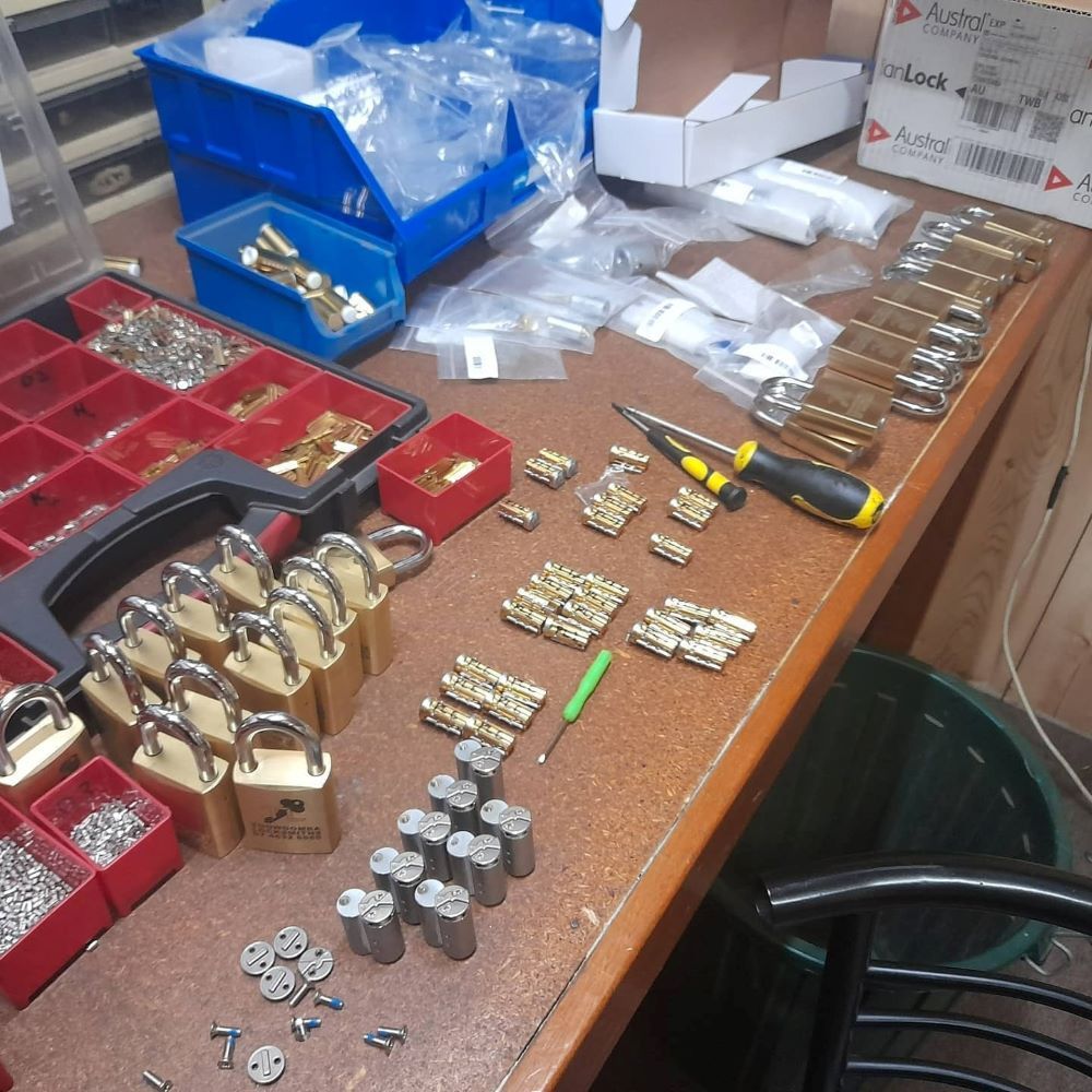 A Table with A Bunch of Keys and A Screwdriver — Toowoomba Locksmiths in Warwick, QLD