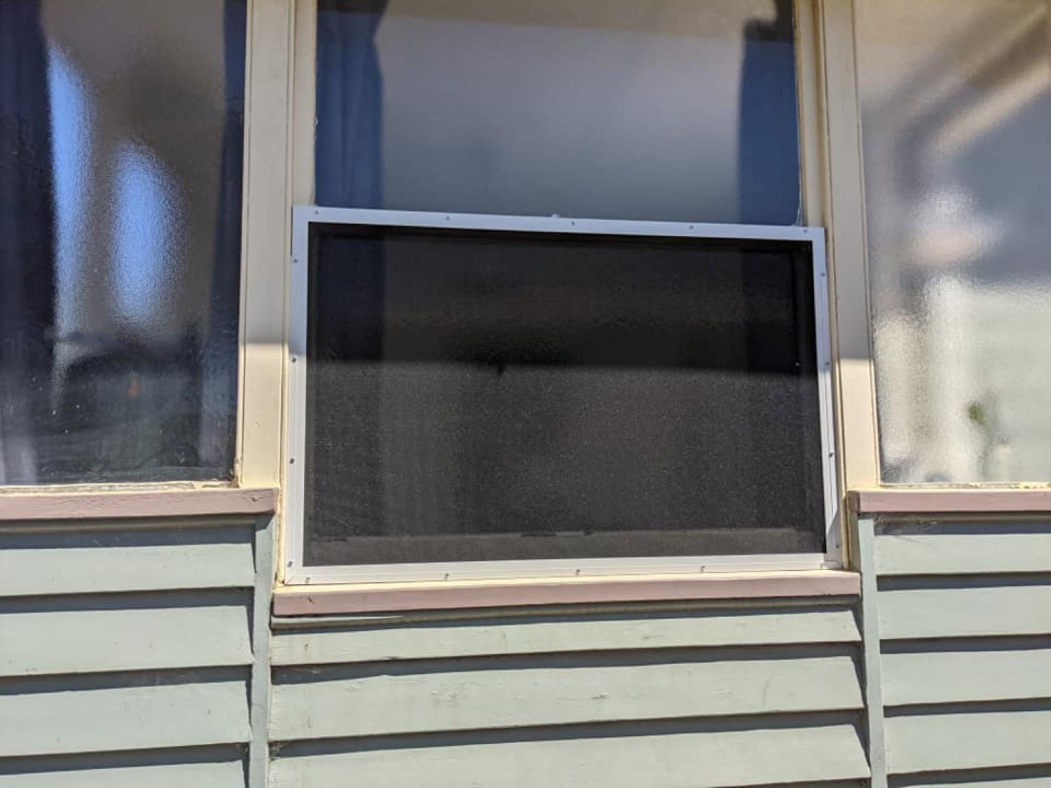 A Window with A Screen on It — Toowoomba Locksmiths in Highfields, QLD