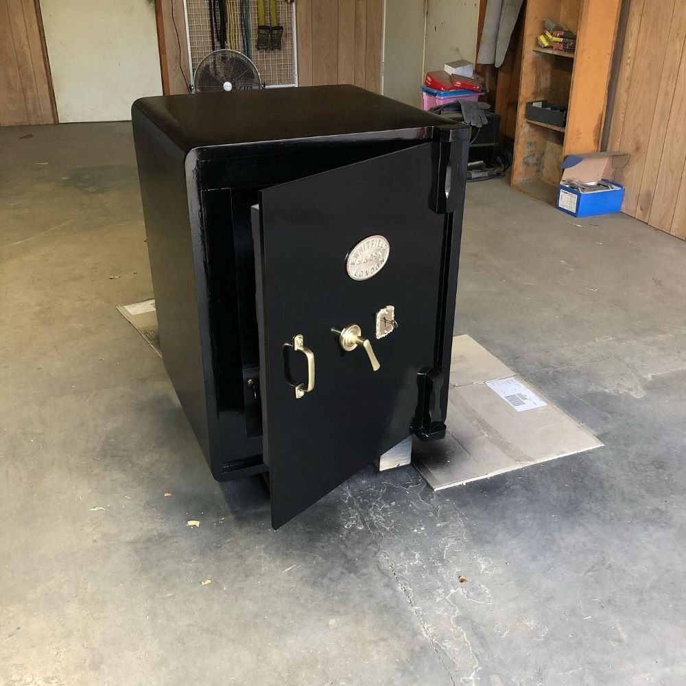 A Black Safe with The Door Open — Toowoomba Locksmiths in Dalby, QLD