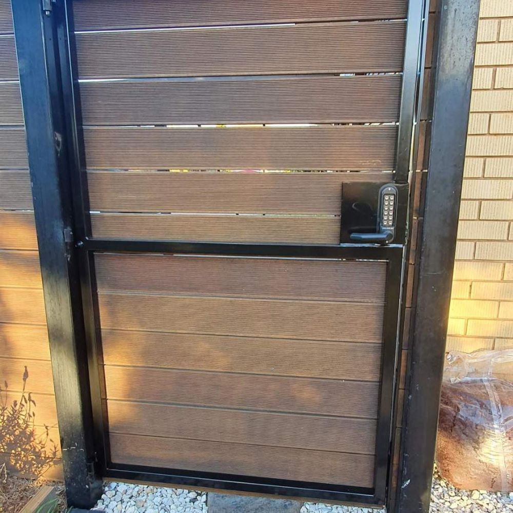 A Wooden Gate with A Black Frame — Toowoomba Locksmiths in Warwick, QLD