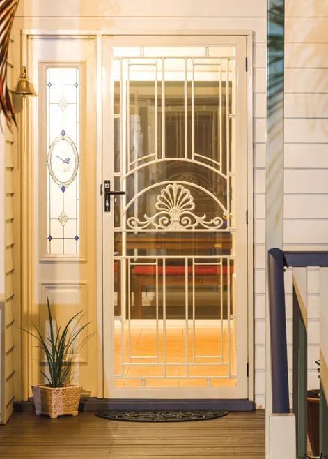 A White Door with A Stained Glass Design on It — Toowoomba Locksmiths in Toowoomba City, QLD