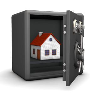 Safe with A House Illustration — Toowoomba Locksmiths in Toowoomba City, QLD