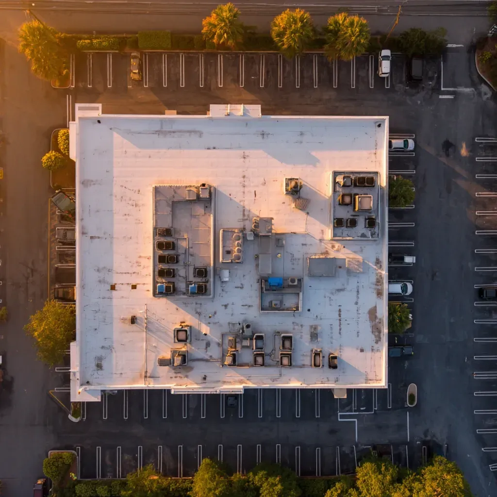 Tampa FL roofing pros providing commercial roof sealing for retail stores, schools, and strip malls.