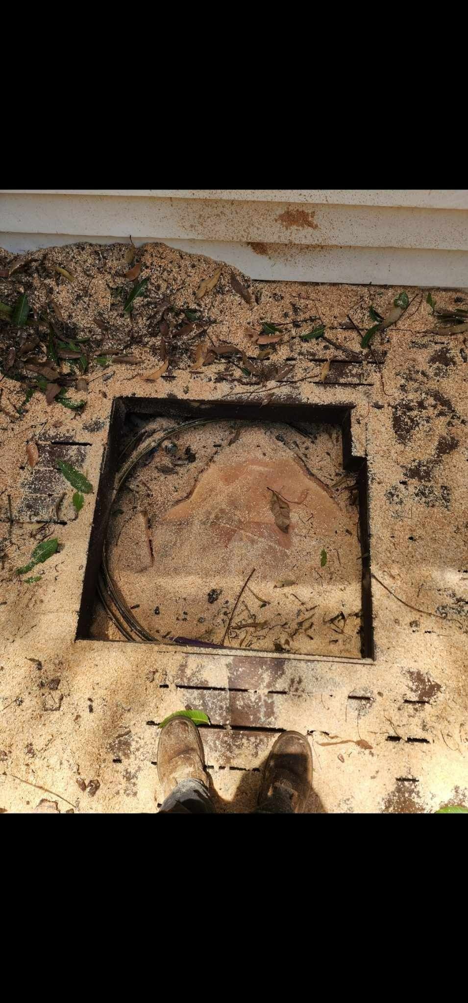 Ancient Wall Niche With Faded Mural Showing Weathered Stone — Barlows Tree Services in Rockhampton, QLD