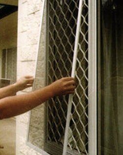 Installing Glass Window - Security Fitters in Cairns, QLD