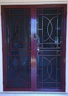 Glass Door With Steel Mesh - Security Fitters in Cairns, QLD