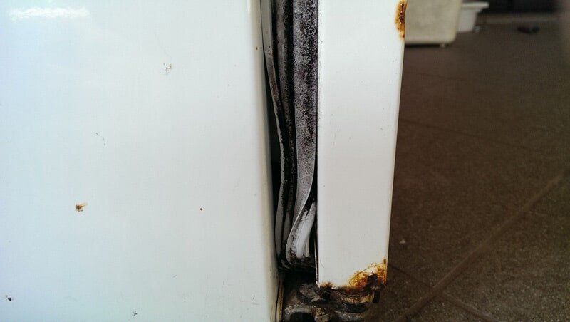 Broken Fridge Seals and corroded parts of refrigerator — Darwin Mobile Fridge Seals in Darwin, NT