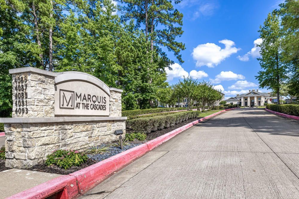 Apartment signage at Marquis at The Cascades in Tyler, TX.