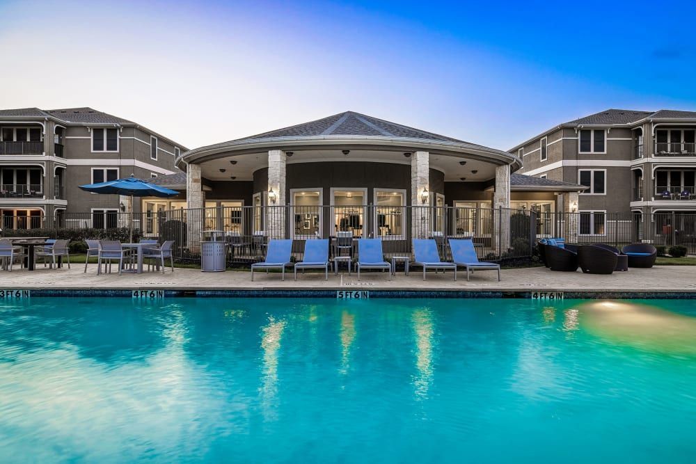 Resort-style swimming pool at Marquis at The Cascades in Tyler, TX.