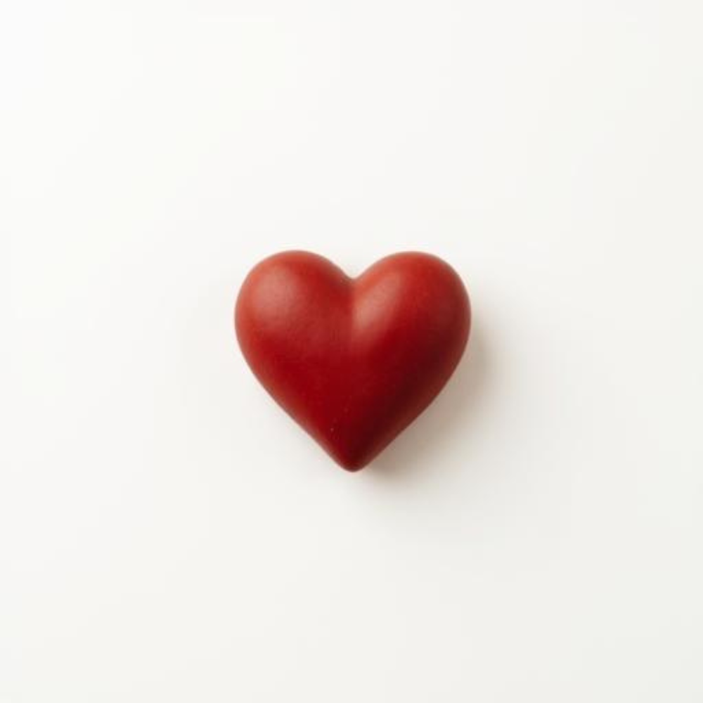 Red heart on white background.
