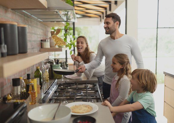 Family Preparing Food in Kitchen — Jacksonville, FL — Appliance Doctors