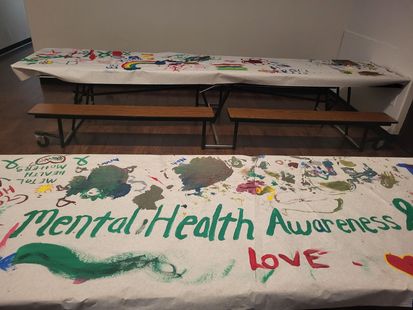 a table with mental health awareness written on it