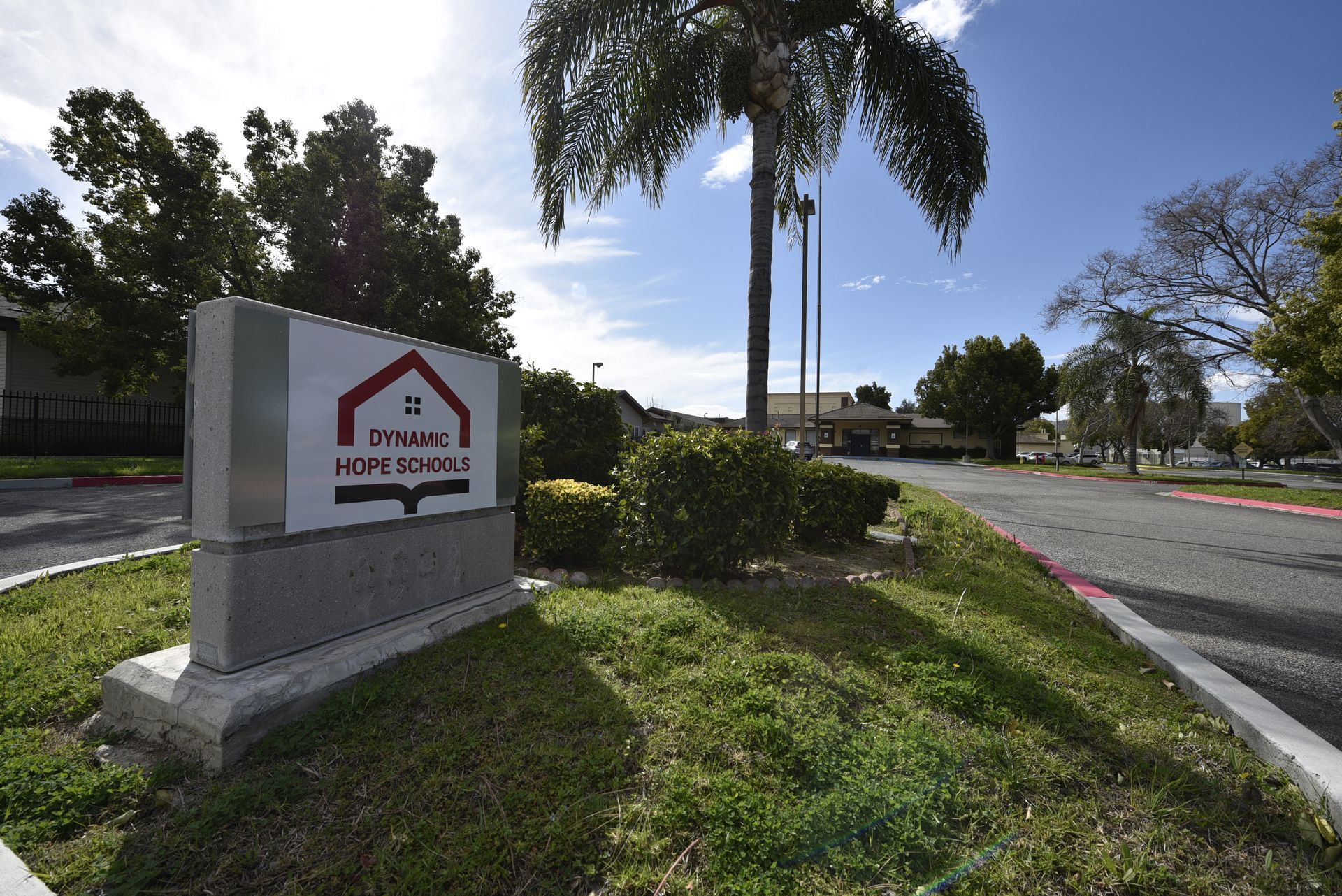 a special needs school with a sign in front of it that says Dynamic Hope Schools