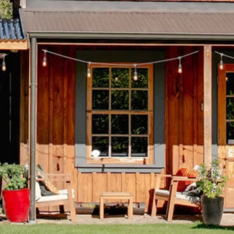 A picturesque vista of grapevines against the backdrop of Central Otago's rugged landscape