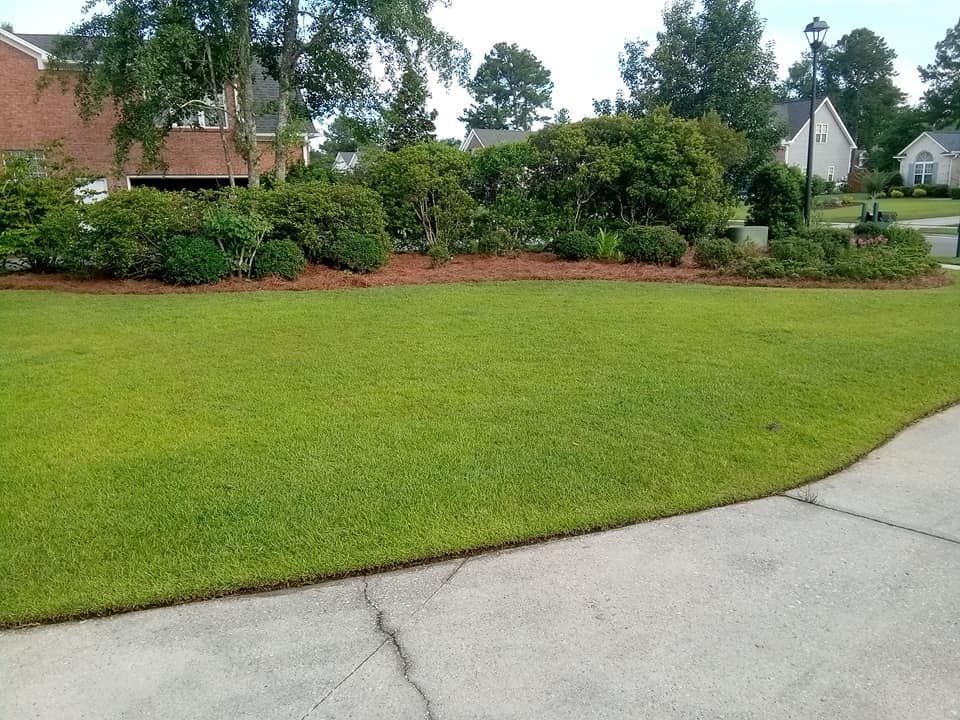 A House With a Large Lawn — Leland, NC — Clarida's Cleaning and Hauling Services