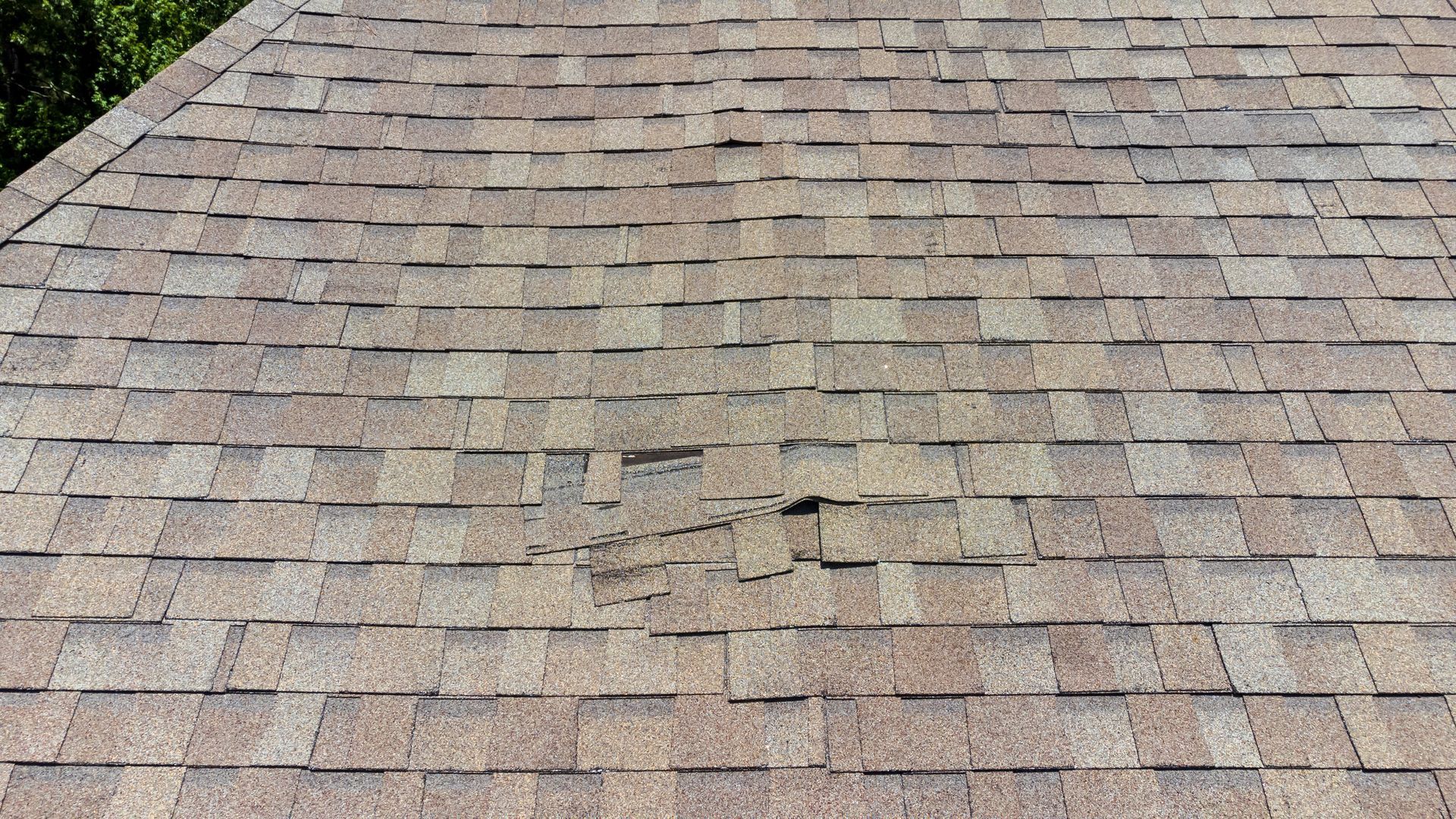 A close up of a roof with a hole in it